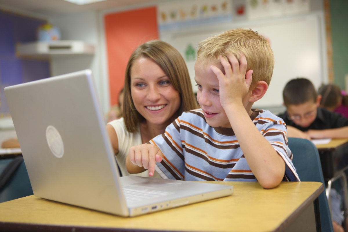 parent on computer with child